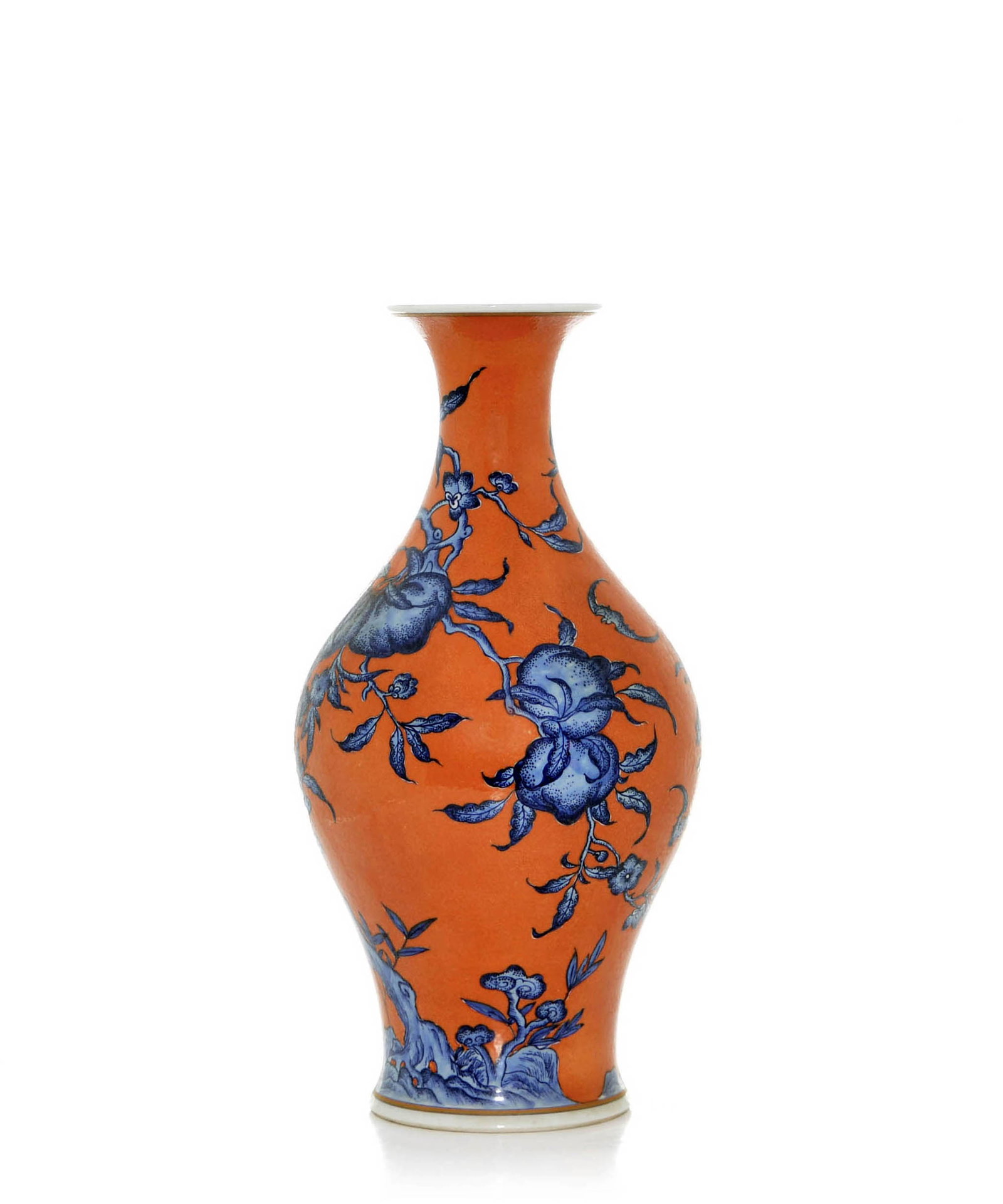 Fine Chinese Iron-Red 'Peach' Vase: Ceramic vase featuring a bright orange body decorated with blue and white botanical motifs including peaches, flowers, and gnarled branches. The vessel has a bulbous body that tapers to a slender neck