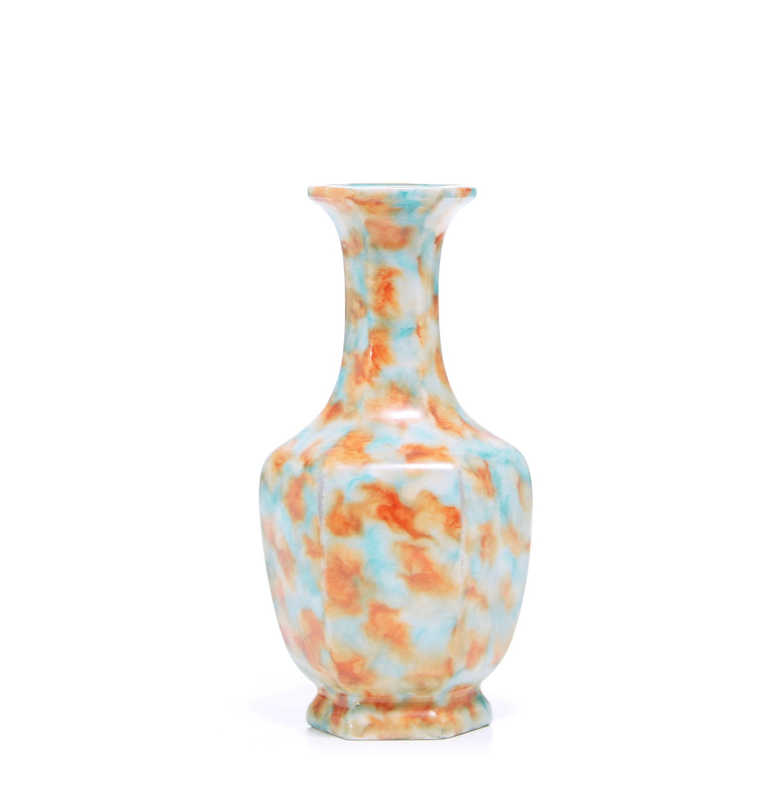 Rare Chinese Marble Glaze Octagonal Vase: Vase of elegant octagonal section, the faceted body rising from a conforming splayed foot to a slender neck with a delicately flared rim. The vessel is enveloped in a striking mottled glaze characteri