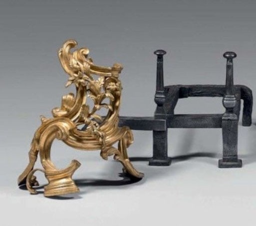Bronze Andiron: Andiron in chased and gilded bronze with rocaille decoration of scrollwork embellished with flowering and leafy branches