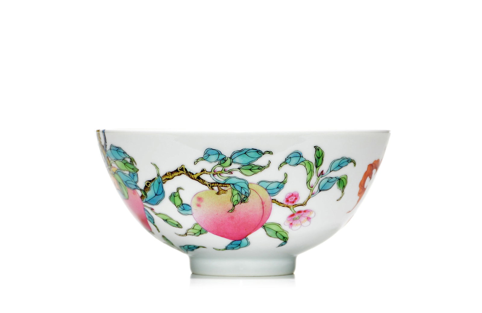 Chinese Famille Rose Peach Bowl: The finely potted bowl is decorated in famille rose enamels with fruiting peach branches, blossoms and leafy foliage, interspersed with iron-red bats, the design continuing on the interior. The recess