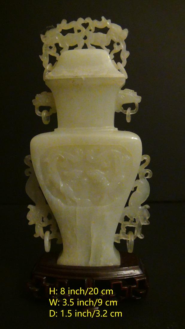 Chinese Green Jade Bottle: H: 8 inch/20 cm W: 3.5 inch/9 cm D: 1.5 inch/3.1 cm Chinese Green Jade Bottle consists of two parts the cap is removable and perfectly fits the bottle. There is a natural chip on the bottle showed on