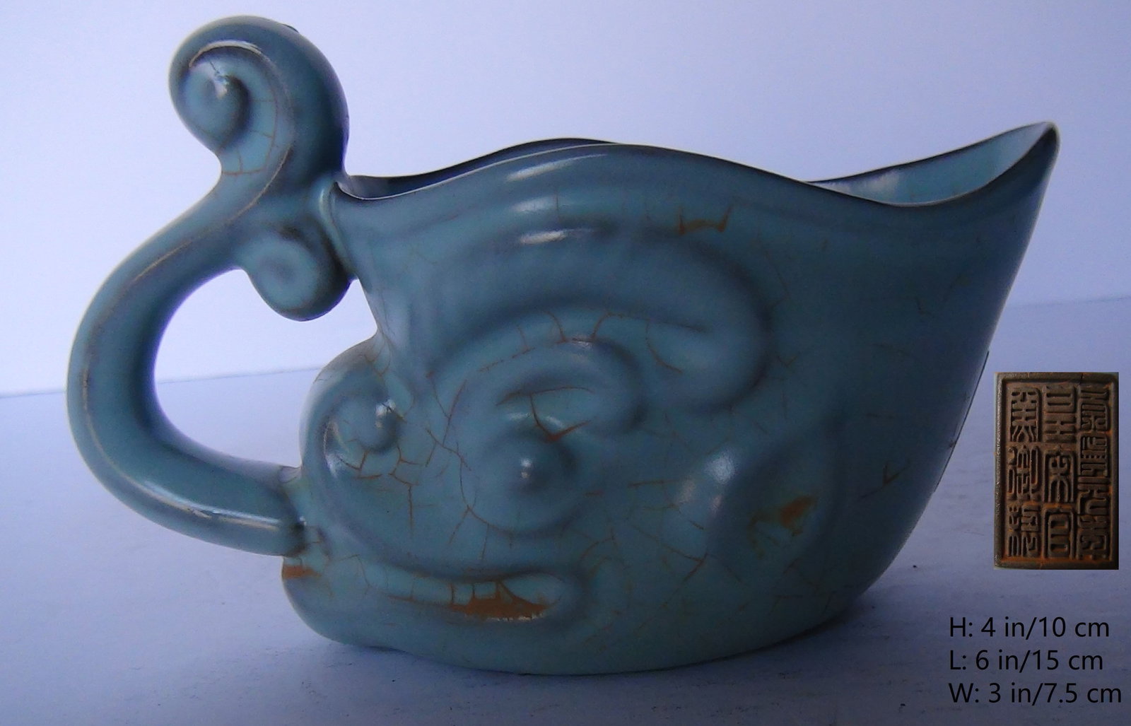 A VERY SPECIAL CHINESE ANTIQUE BLUE GLAZED CUP: THIS ITEM H: 4 in/10 cm L: 6 in/15 cm W: 3 in/7.5 cm Weight: FEATURES 1. Marked CHONG NING YUAN NIAN HUANG SONG GUAN YAO YU ZHI and signed. 2. The cup is small, thin, and light, which corresponds to
