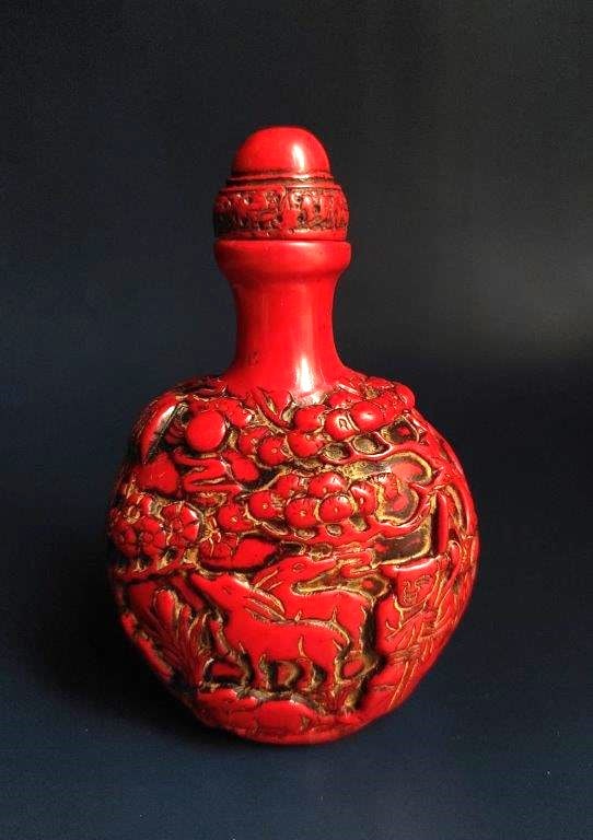 A UNIQUE LARGE CHINESE ANTIQUE CORAL SNUFF BOTTLE: THIS ITEM H: 4.3 in/11 cm W: 2.8 in/7 cm D: 1.6 in/4 cm Weight: 111 g. FEATURES 1. This bottle is larger than most snuff bottle. 2. Handmade and carved figures, horse, and sheeps. 3. Profound Chinese