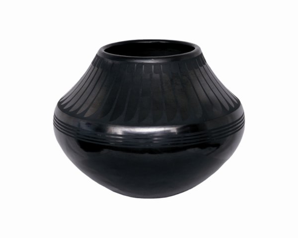 A San Ildefonso blackware jar, mid 20th century. M