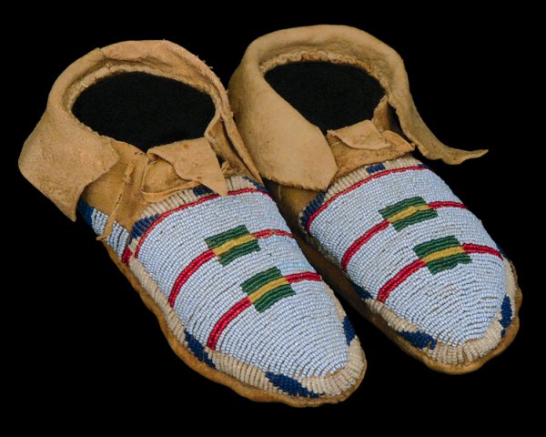 A rare pair of Classic Period Crow child's moccasi