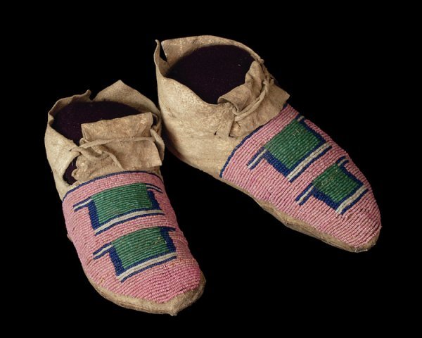 A pair of rare Classic Period Crow child's moccasi