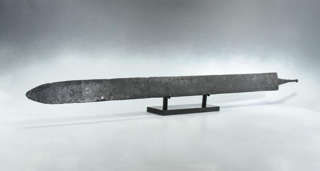 ROMAN IRON LEGIONARY SPATHA SWORD: CA. 200 – 400 AD. Rare Roman Legionary sword of Spatha type.; broad parallel-sided spatha with convergent tip; rectangular-section tang at the shoulder developing to square-section at the upper end.