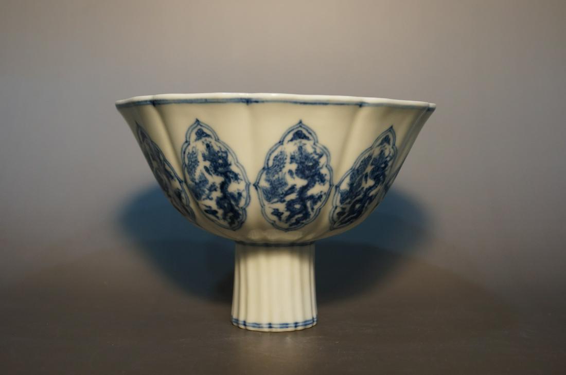 Chinese Ming Dynasty Blue And White Porcelain Stem Bowl: The height is 11.5cm and the mouth diameter is 17cm.