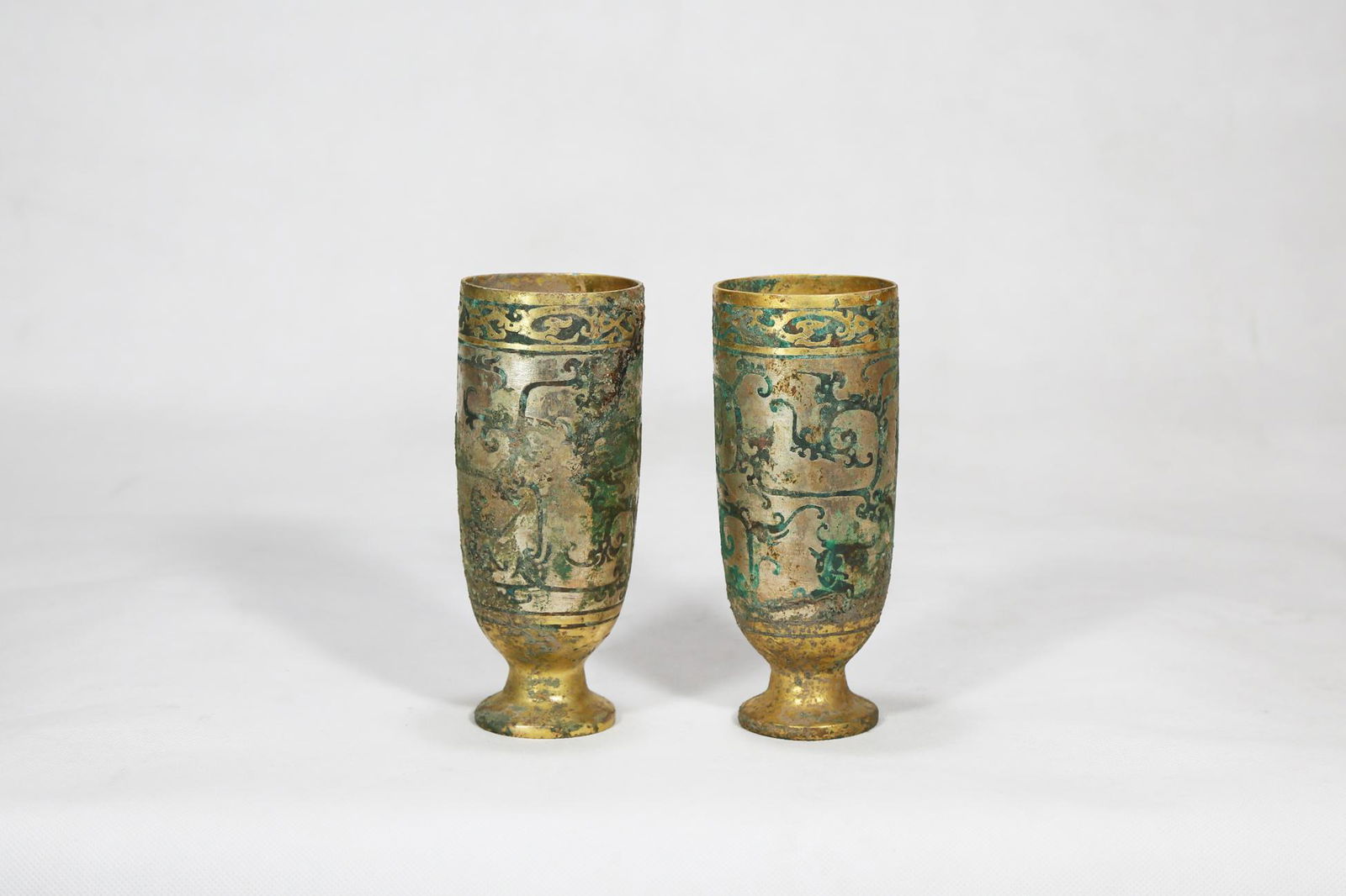 Chinese Pair Of Bronze Gold Gilded Beast Pattern Cups: Height 17cm diameter 7cm