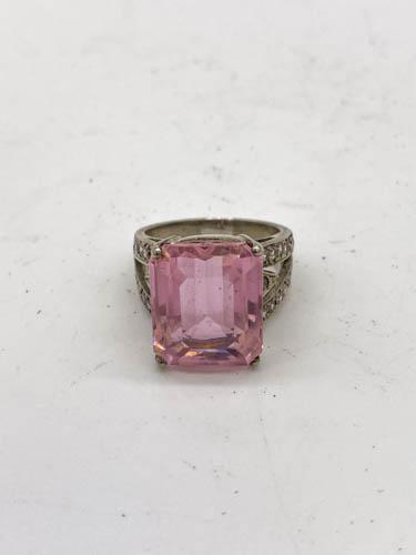 Pink Cubic Zirconia Ring in Sterling Silver Ring: Pink cubic zirconia on sterling silver Setting w/pink cubic zirconia accents on sides of ring. - Total Gross Weight 10.13 g