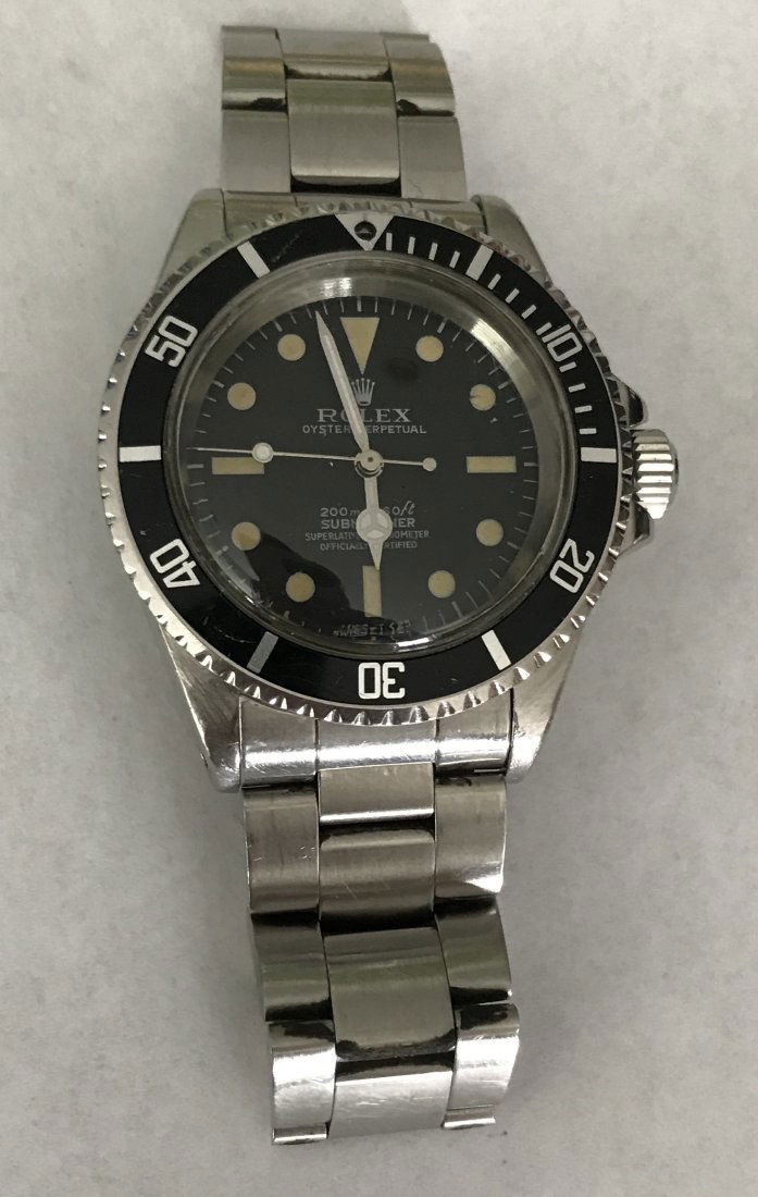 Men 1970 1970's Rolex 5512: 1970's Rolex 5512 Stainless Steel Submariner Men's Watch. Has Ceramic Bezel. Original Band. Very Good Condition. Serial Number Series: 3,2XX,XXX