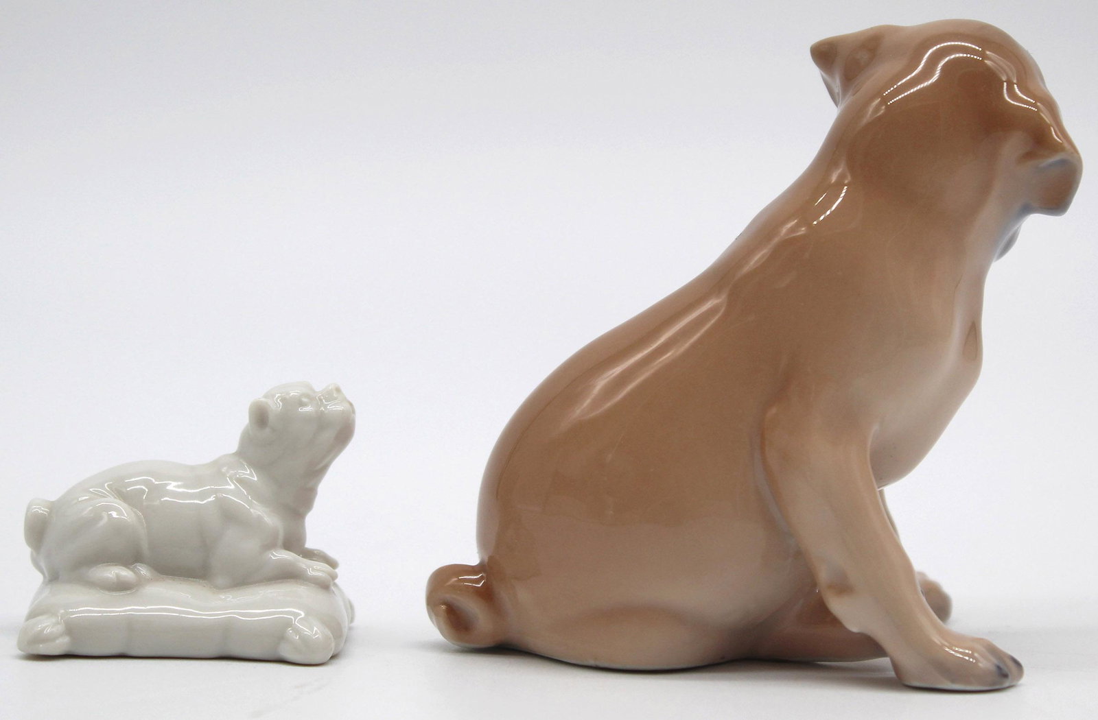 Porcelain. Bing & Gröndahl and Nymphenburg.: Up to 83 mm high. No corruptions found. Shipping of this object by a third-party provider possible. A list of selected trusted shipping partners is included with each invoice. The auction house does n