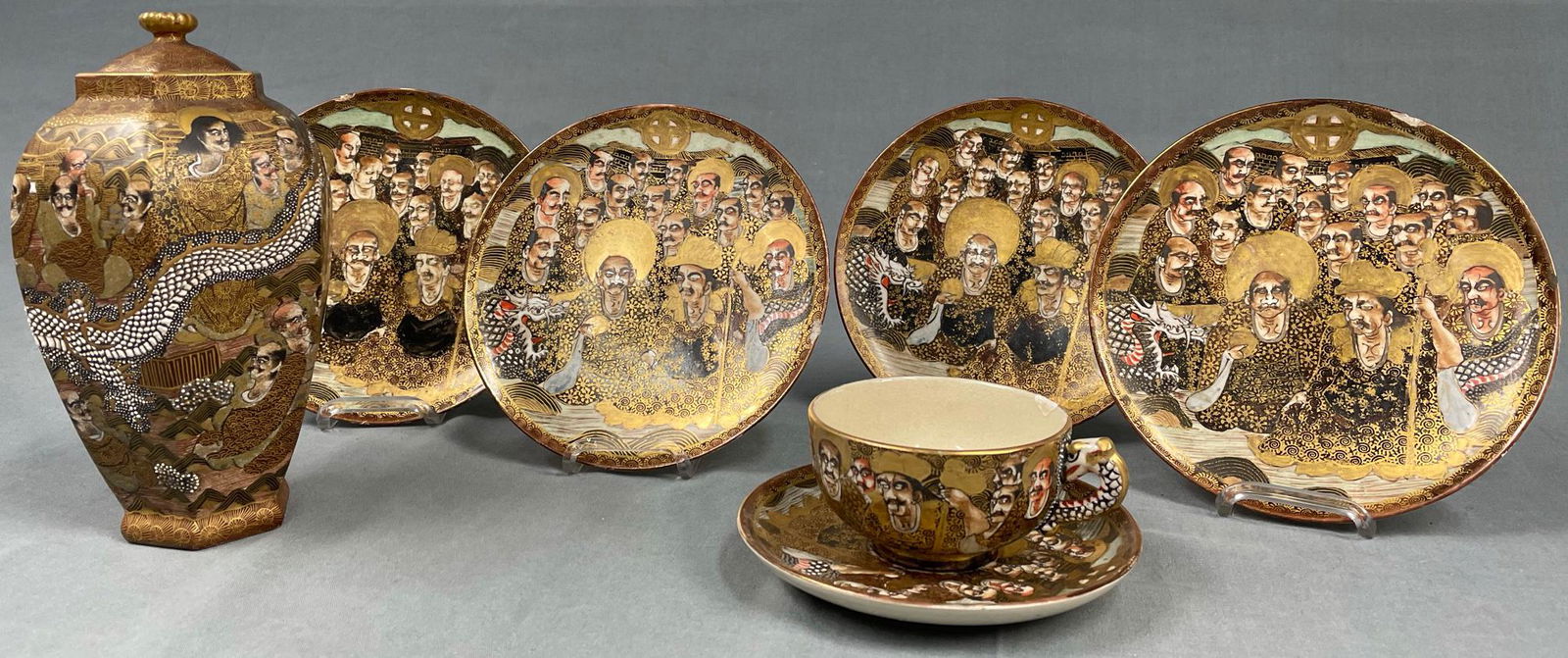 4 plates, lidded vase, cup and saucer. Satsuma. (1 of 18)