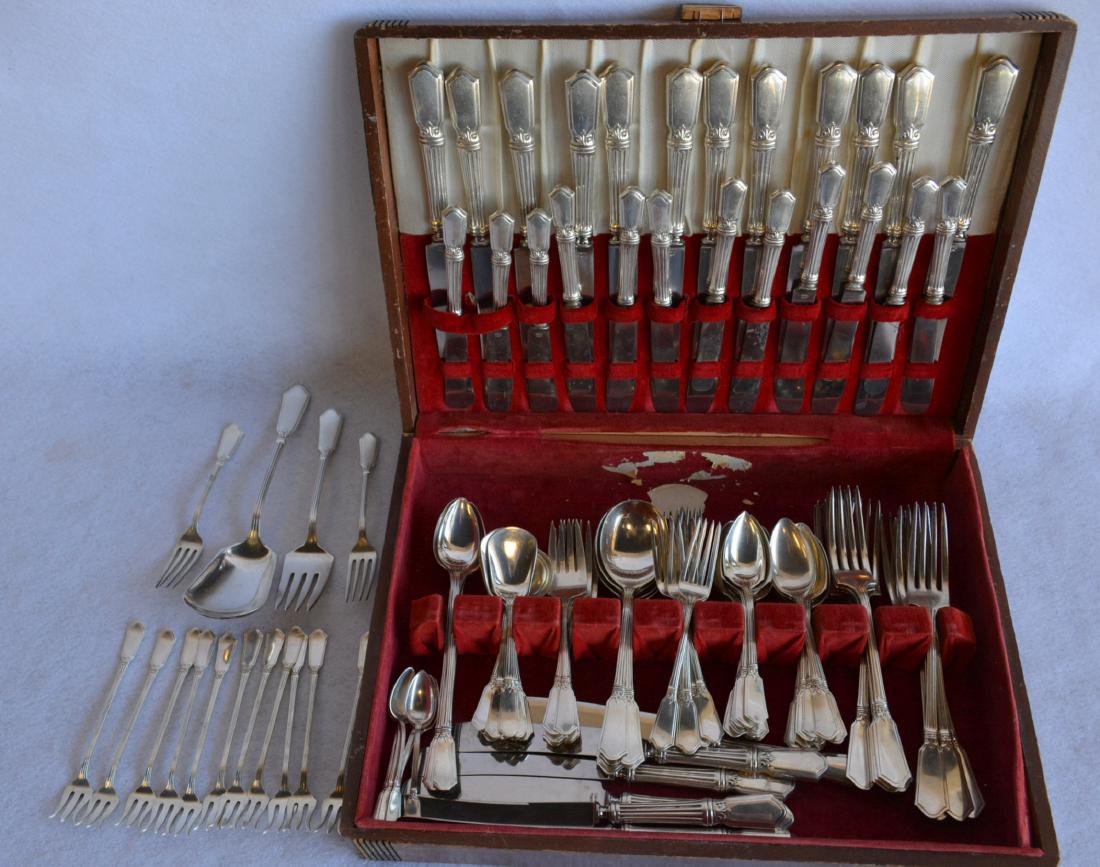 Sterling silver flatware set signed Alvin in the: Sterling silver flatware set signed Alvin in the Winchester pattern - designed by Frederick Kaufmann 1917 - no monograms. Set consists of 18 dinner knives, 12 butter knives, 6 ice tea spoons, 22 teasp