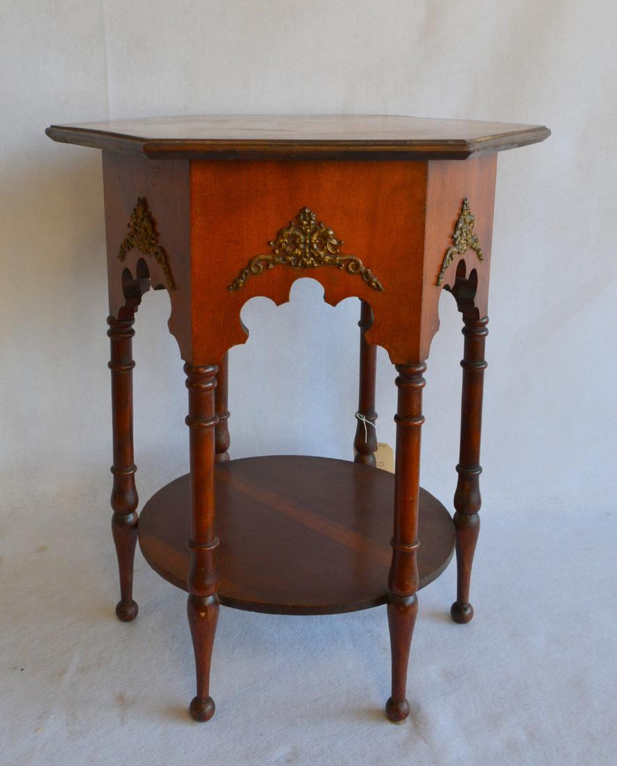 Hexagonal Arts & Crafts birch end table with turned: Hexagonal Arts & Crafts birch end table with turned legs and applied ormolu – very good condition. 22.5"D x 24.75"H. Circa 1920.