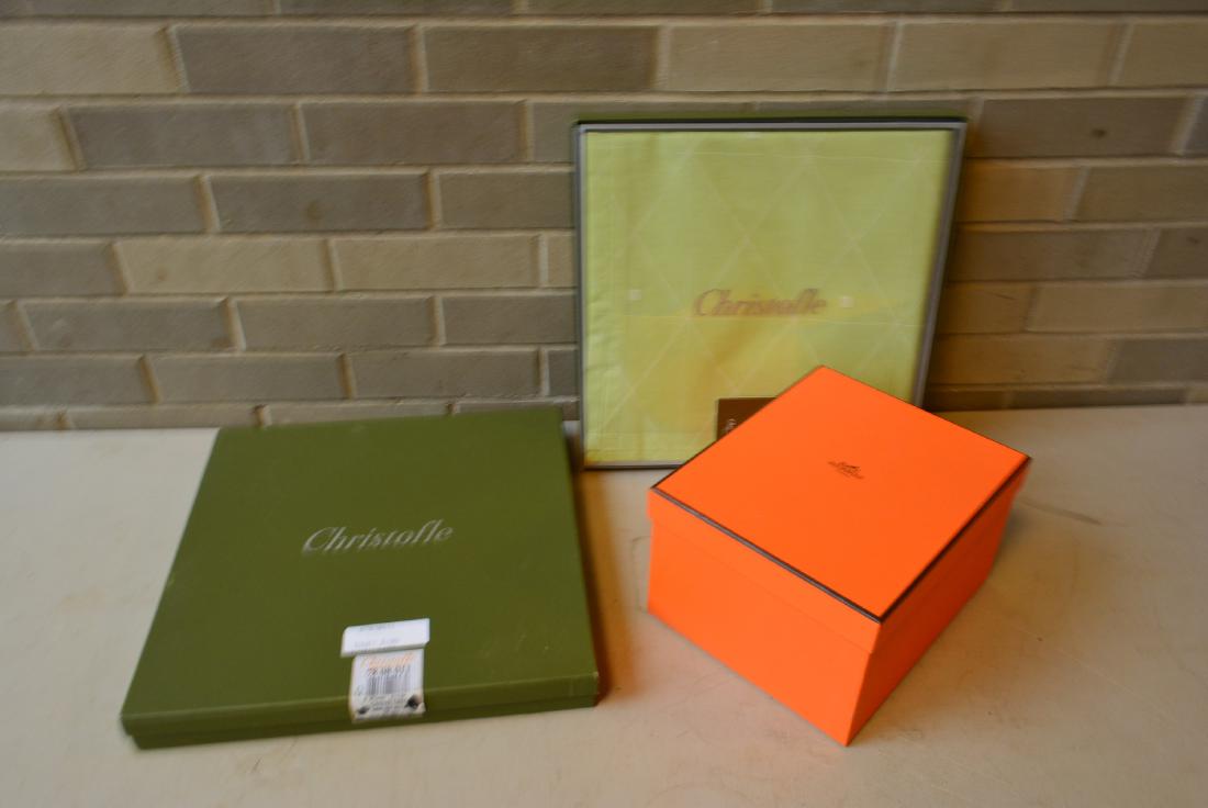Two modern designer objects including a Hermes: Two modern designer objects including a Hermes porcelain painted Medium Vase signed on base Balcon du Guadalquivir / Hermes Paris, in original box (original selling price $810), and 2 Christofle green