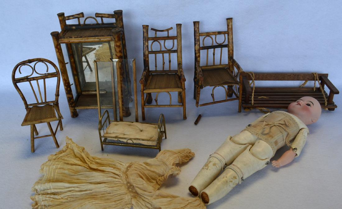 Collection of vintage doll related collectibles: Collection of vintage doll related collectibles including 3 bamboo doll chairs with wicker seats – 8.75"H (one with damaged leg) – circa 1900, slatted wooden porch swing – 9.25"L, bamboo shelf u