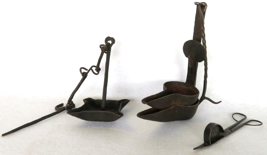 Two early iron lighting devices including a double (1 of 7)