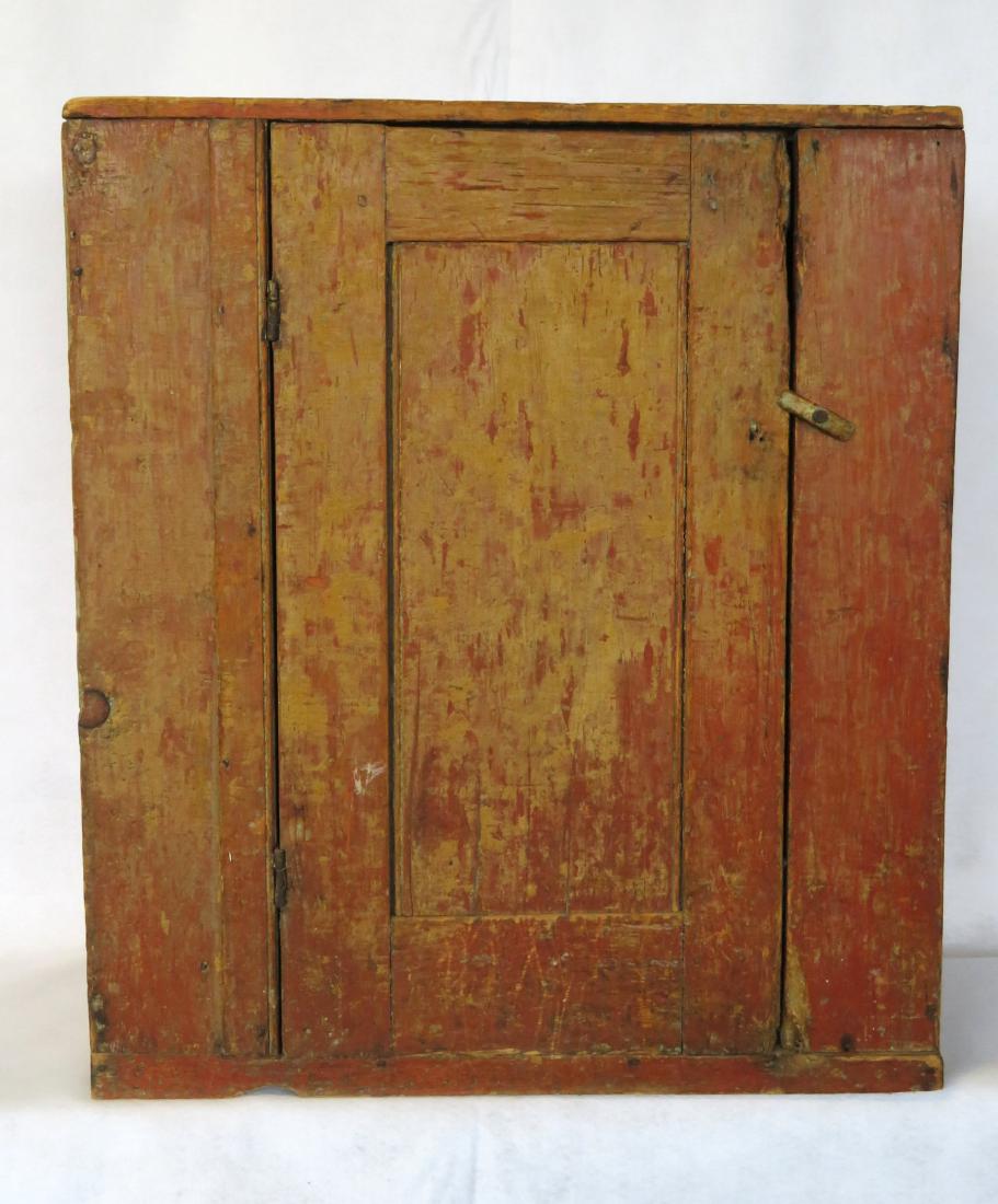 Small primitive 1 door floor cupboard scraped down to (1 of 3)