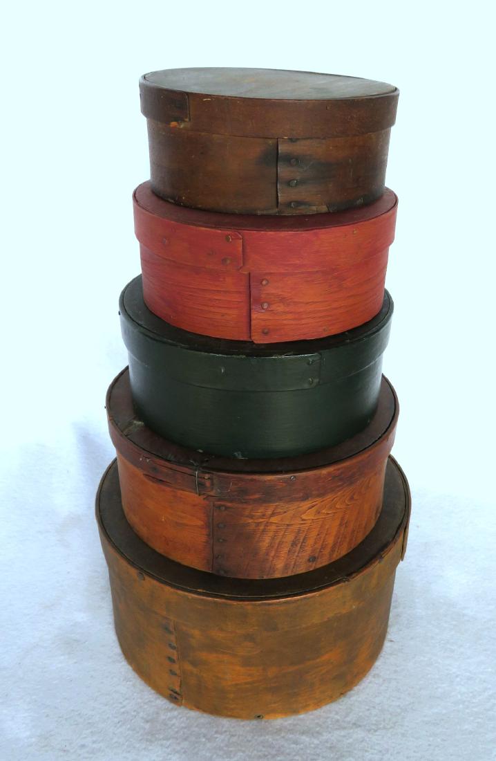 Grouping of 5 stacked pantry boxes ranging in size from: Grouping of 5 stacked pantry boxes ranging in size from 6”D to 9.25”D – two with minor rim repairs, overall good condition.