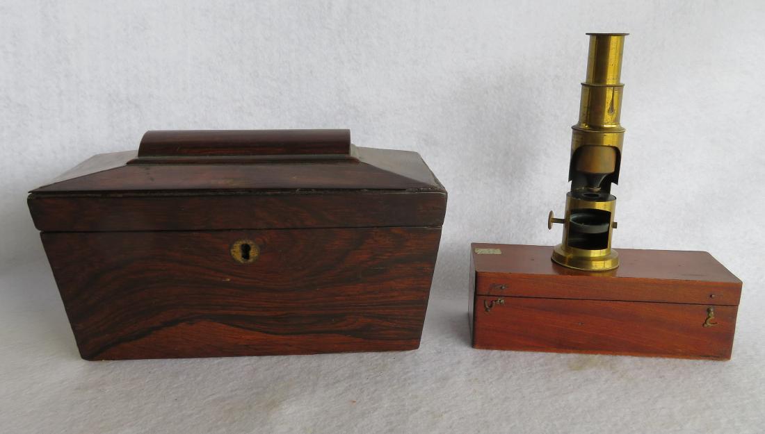 Two country items including a rosewood tea caddy: Two country items including a rosewood tea caddy (missing interior compartments), and a small brass microscope in original fitted box also containing its original specimen brass tweezers – very good