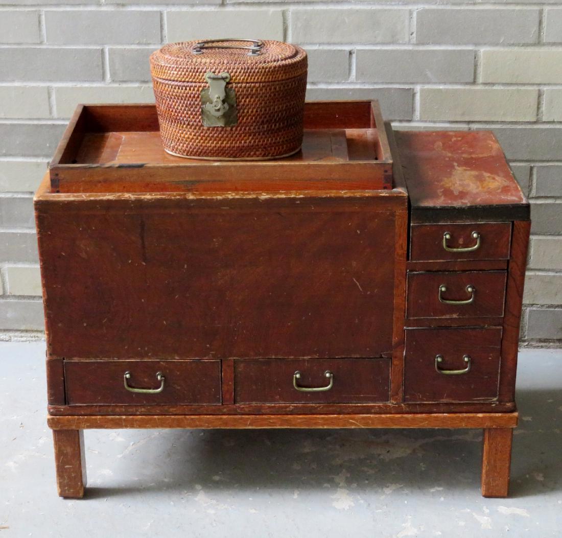 Two oriental decorative objects including a Japanese: Two oriental decorative objects including a Japanese Hibachi table with copper insert, having a central copper basin over 2 drawers, adjacent to 3 side drawers – removable serving tray top - probabl