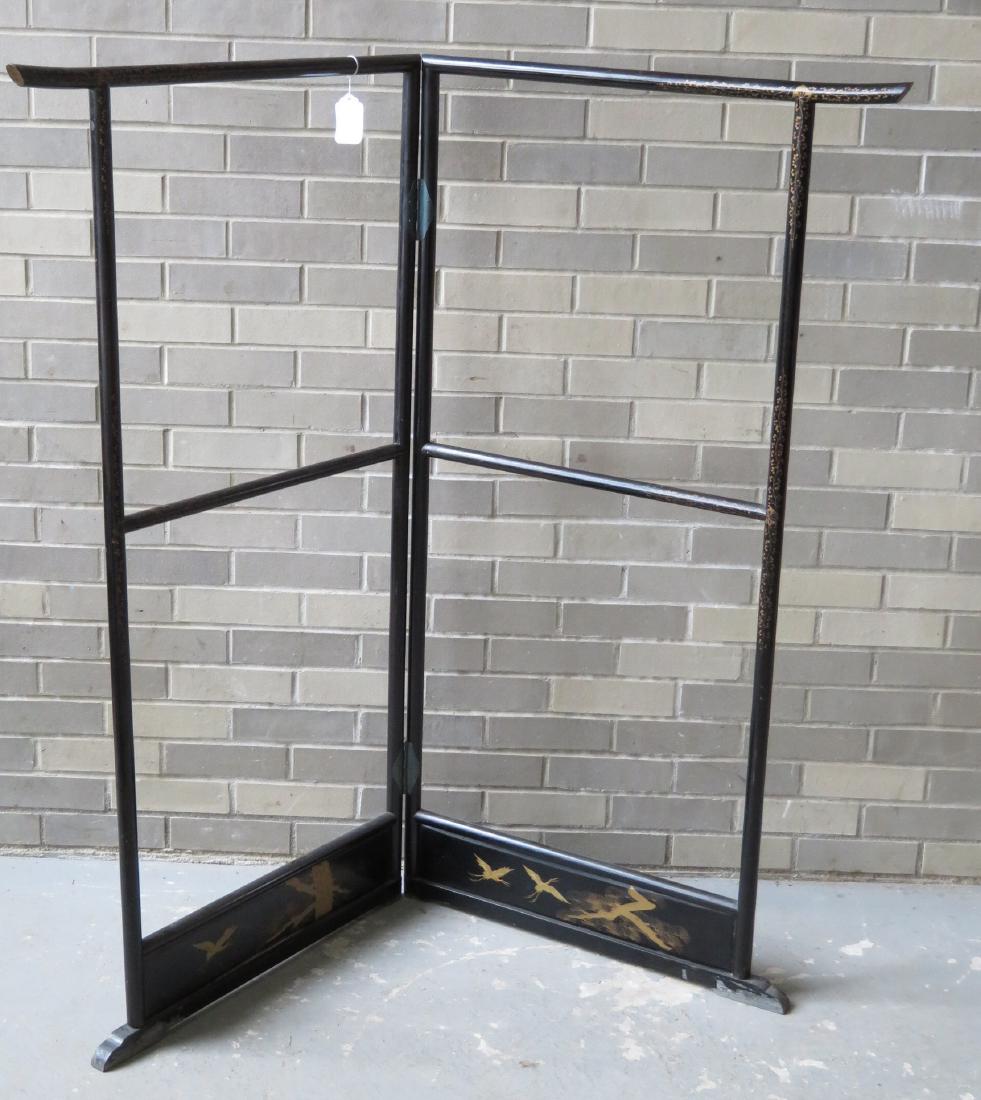 Oriental 2 section Kimono rack - ebonized frame: Oriental 2 section Kimono rack - ebonized frame decorated with gold vine and leaves. Late 19th to early 20th century. 54"H x 28.75"W (closed position). Some paint losses at base, surface scratches aro