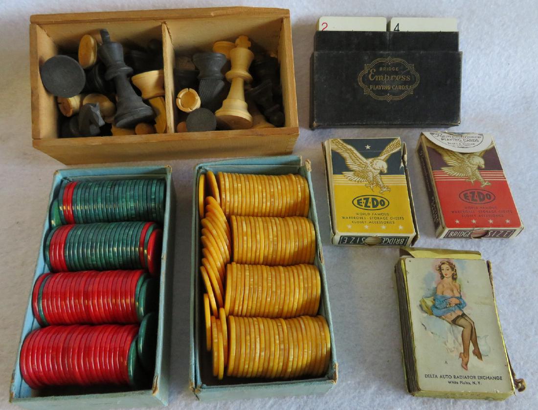 Grouping of playing cards, chips, and chess set: Grouping of playing cards, chips, and chess set including advertising cards in original box (box damaged) signed Remembrance Playing Cards (Bridge) with image of pinup girl on each card,2 box3w of Rem