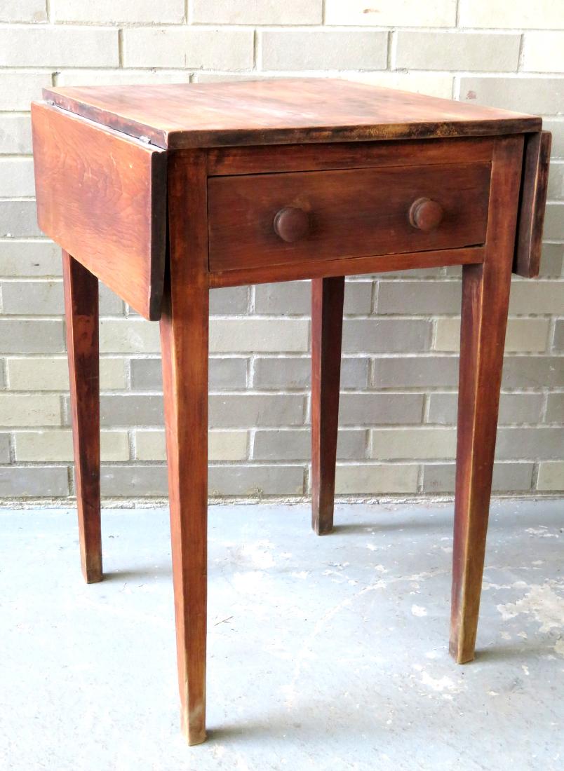Early tapered leg drop-leaf sewing table with single: Early tapered leg drop-leaf sewing table with single drawer - traces of old red stain over birchwood - early 19th century.
