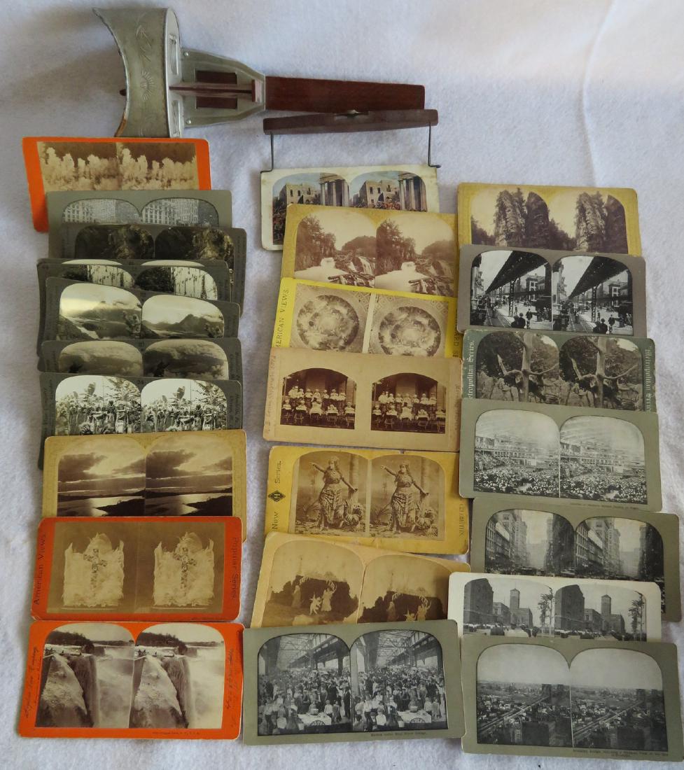 Grouping of 24 stereoviews and a stereoviewer. Views: Grouping of 24 stereoviews and a stereoviewer. Views include an unusual photo of 12 babies sitting in high chairs and strollers and dated 1874, Market Under East River Bridge, Brooklyn Bridge and Bird
