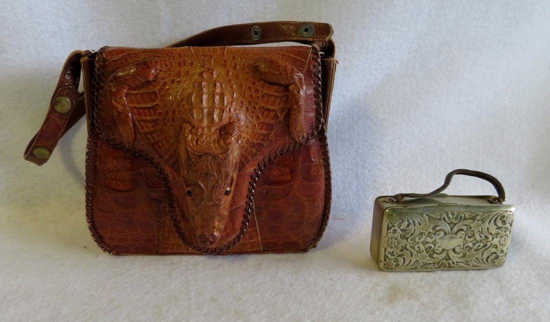Ladies full body alligator handbag stamped Made in: Ladies full body alligator handbag stamped Made in Cuba, together with a marked German Silver purse. Slight use wear, otherwise good condition.