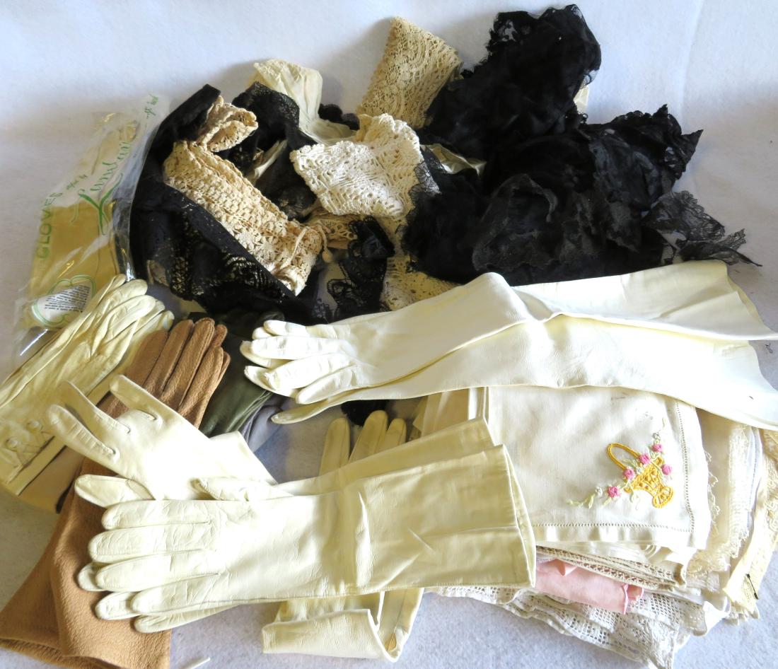 Grouping of textiles including pieces of lace, black: Grouping of textiles including black French lace, white lace, embroidered napkins, lady’s gloves, etc.