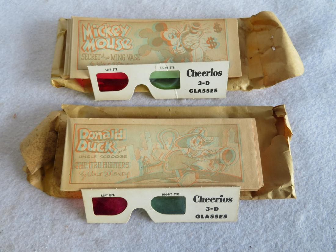 Two packages of 3-D cartoon comic books distributed by: Two packages of 3-D cartoon comic books distributed by Cheerios Cereal – each package contains 8 Mickey Mouse and Donald Duck small comic books to be read with the 3D glass that are included in each