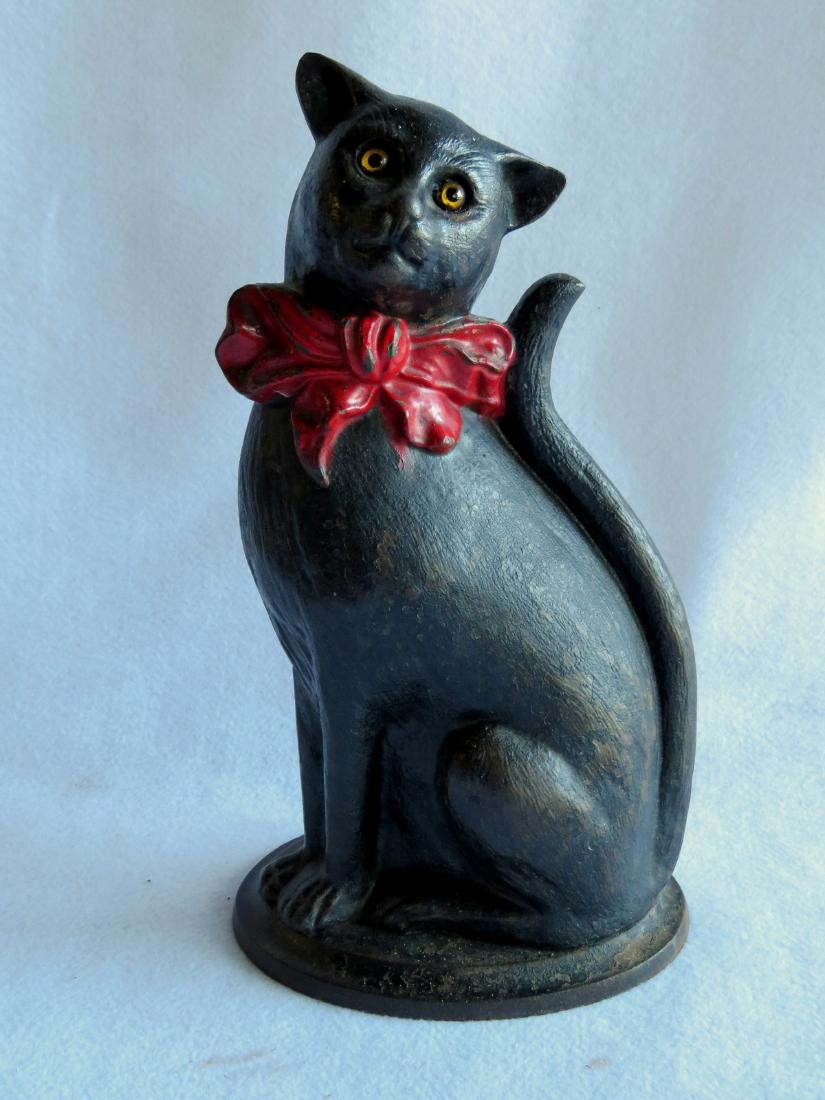Large hollow cast iron seated black cat door stop with Nov 04, 2017