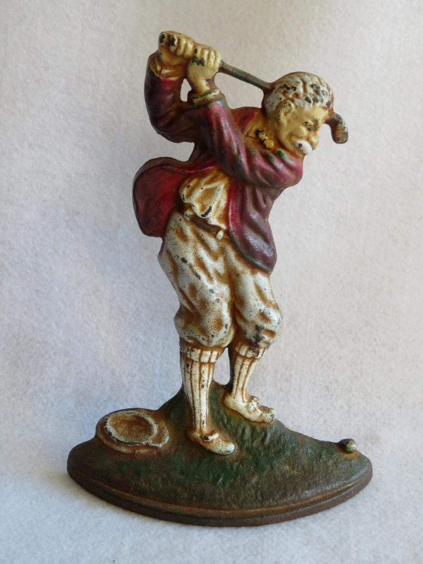 Cast iron swinging golfer doorstop "A Difficult Lie",: Cast iron swinging golfer doorstop "A Difficult Lie", circa 1920, faintly stamped on reverse No. 238 by the Hubley Foundry, Lancaster PA. Excellent original paint. 9.5"H.