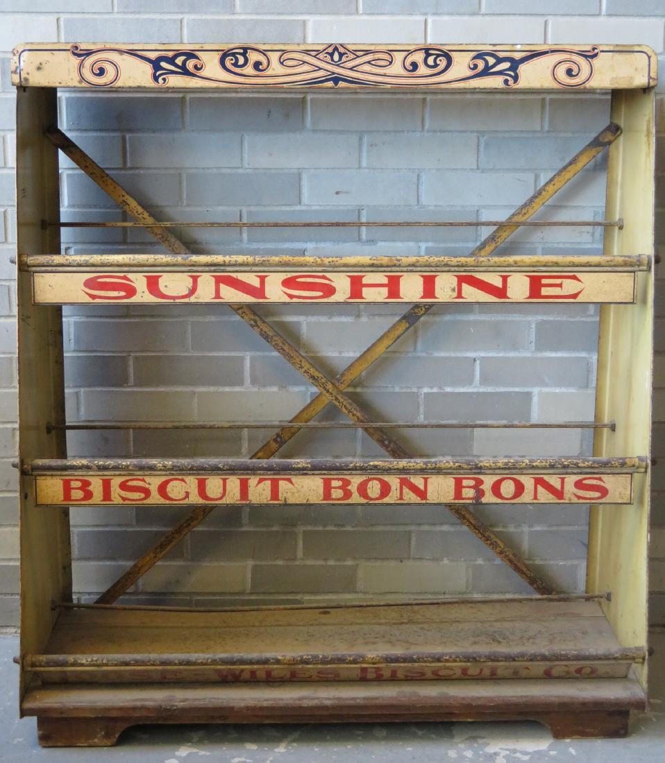 Sheet iron paint decorated country store display case: Sheet iron paint decorated country store display case for "SUNSHINE BISCUIT BON BON" - Original red and blue paint on a yellow background - some expected use wear including surface scratches, several 