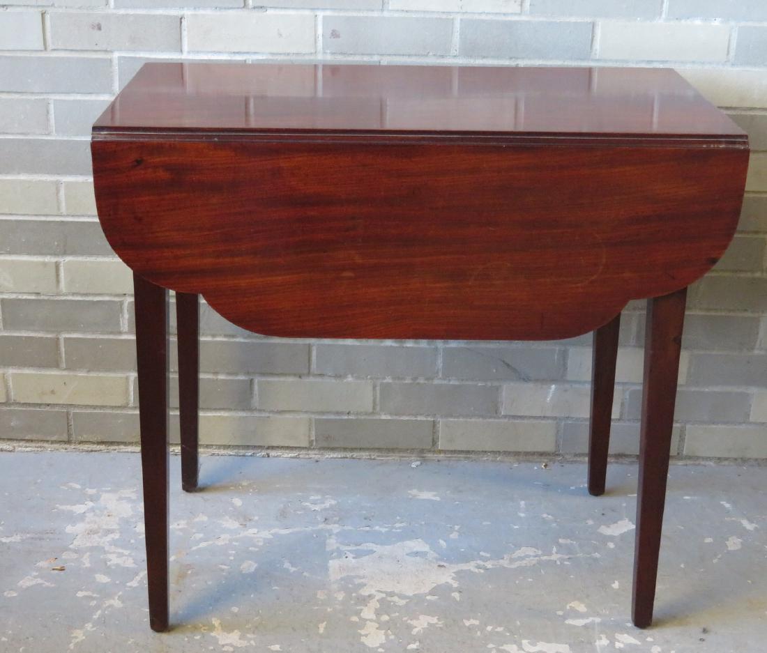Hepplewhite pembroke table with shaped leaves and: Hepplewhite pembroke table with shaped leaves and single drawer with original brass pull, in beautiful mahogany - circa 1810 - slight surface blemished, overall very good refinished condition. Size 31