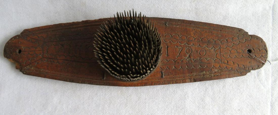 Early hatchel with incised markings "Anno 1790" -: Early hatchel with incised markings "Anno 1790" - slight insect damage in one corner, rose head construction, overall good condition. 26"L x 7"H.