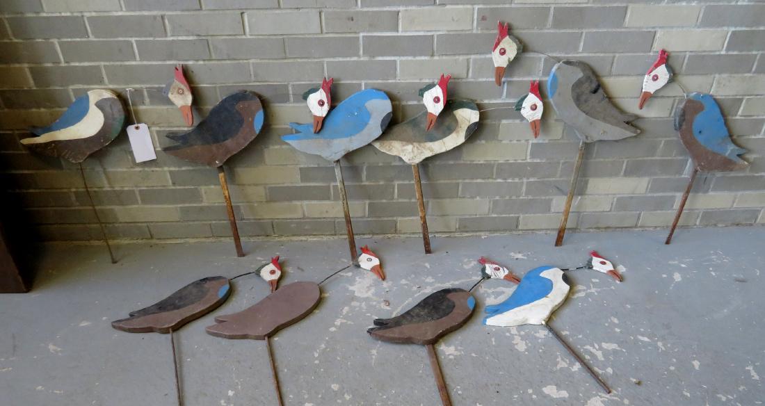 Grouping of 10 folk art stickup wooden lawn ornaments: Grouping of 10 folk art stickup wooden lawn ornaments with articulated heads, in original paint - barn found with some wear and paint losses, but overall good condition. Circa 1930-50. Average size 29