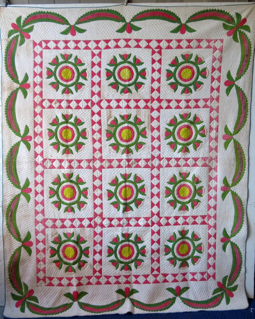 Beautiful green, red, yellow floral applique quilt.: Beautiful green, red,and yellow floral applique quilt on white background in the Rose of Sharon pattern, and having a swag border - the best quilting at 10-12 stitches/inch. Nine of the red swags with