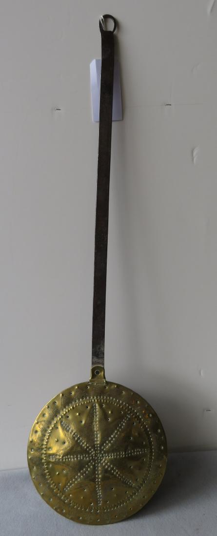 Brass bed warmer with hand forged iron handle - the pan: Brass bed warmer with hand forged iron handle - the pan with a pierced star pattern in lid - use wear, overall good condition. Late 19th to early 20th century. 41"H.
