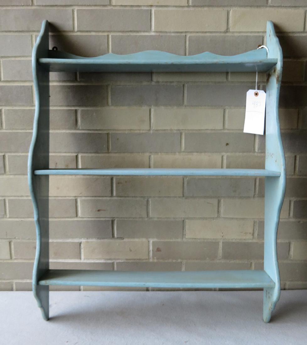 Robin's egg blue 3-tier shaped wall shelf with dark: Robin's egg blue 3-tier shaped wall shelf with dark blue and yellow pinstriped border - very good condition - 19th century. 24"W x 32"H x 7"D.