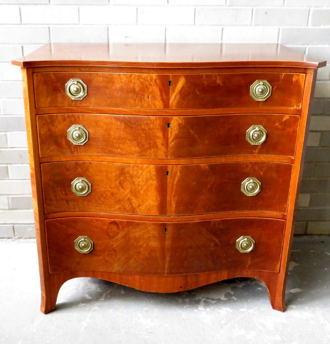 Custom made mahogany chest with 4 graduated drawers on: Custom made mahogany chest with 4 graduated drawers on Hepplewhite French feet, serpentine front, original label marked "This piece was hand made in the workshop of Charak Furniture Co., Boston, Mass.