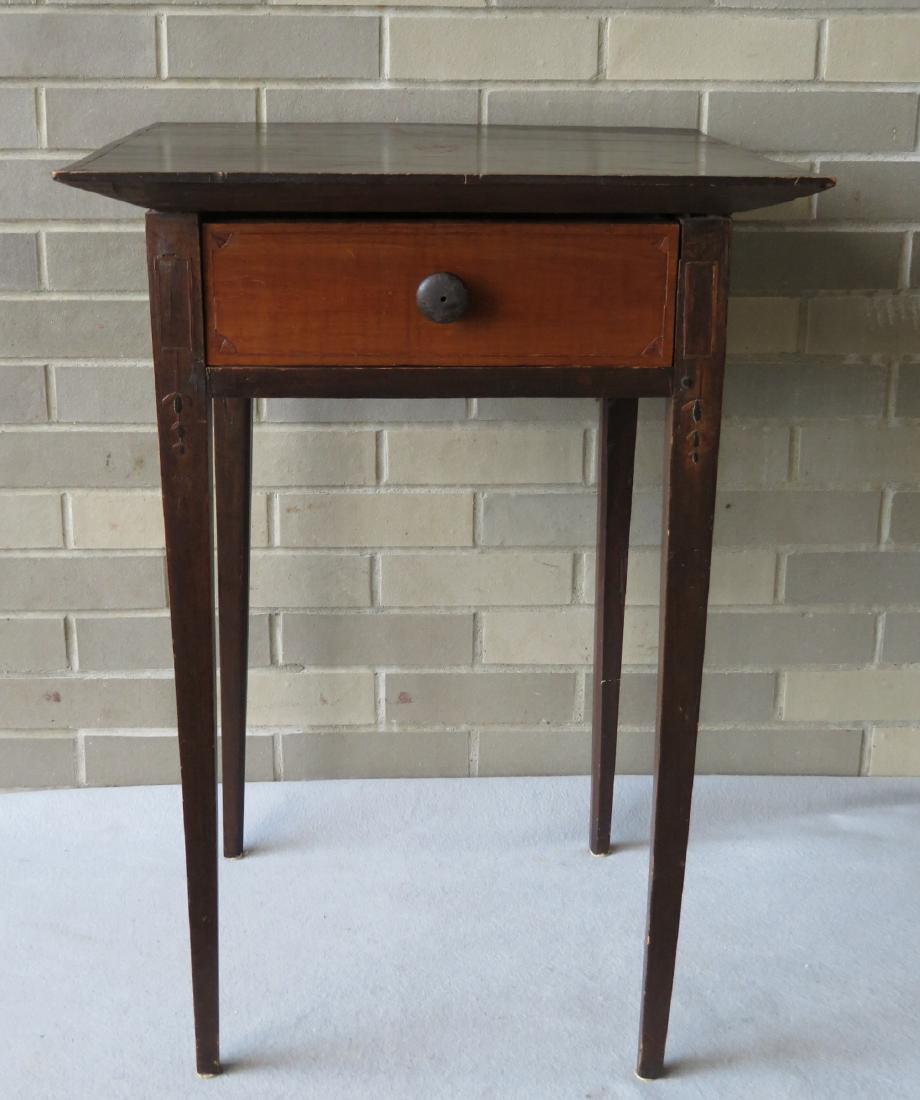 Hepplewhite 1 drawer stand in a darkened old stain, and: Hepplewhite 1 drawer stand in a darkened old stain, and inlays on top, drawer and tops of legs - early 19th century. Refinished front drawer, minor abrasions in top, otherwise good condition.
