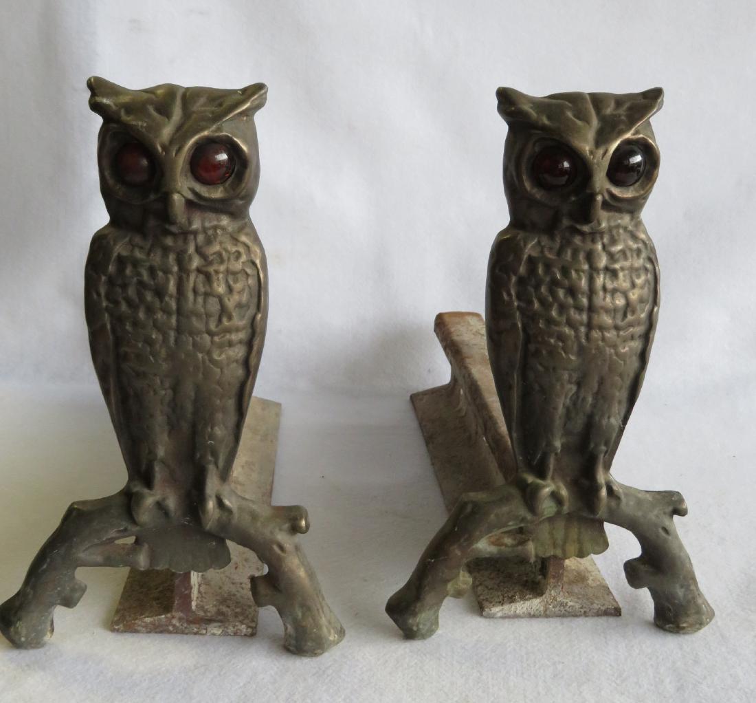 Pair of cast iron owl andirons with large marble glass: Pair of cast iron owl andirons with large marble glass eyes, replace rail road track log holders. Very good condition. 13"H.