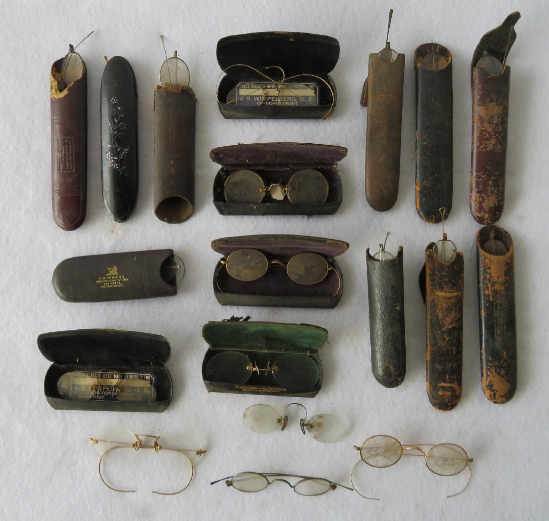 Grouping of 19 pairs of Civil War era and later eye: Grouping of 19 pairs of Civil War era and later eye glasses, most in very good condition and some with Poughkeepsie NY eye glass cases. One pair with ebonized and inlaid case. Provenance: From the loc