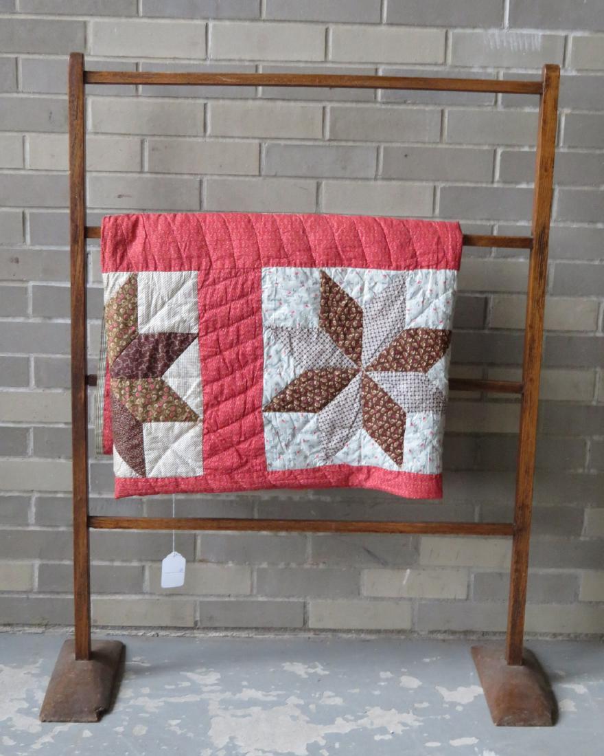 Shoe foot butternut herb drying rack - the feet with: Shoe foot butternut herb drying rack - the feet with through-tenon construction - 35"W x 43.5"H. Two small chips to corner of feet, otherwise very good condition - early 19th century; sold with a 19th