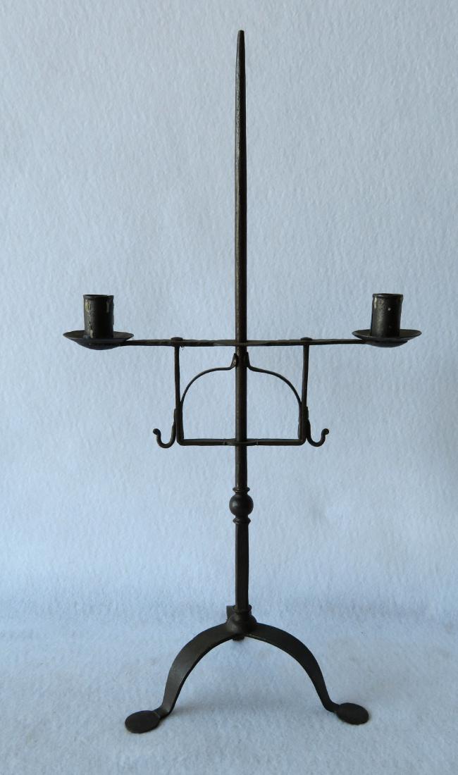 Table top hand forged iron lighting device, 18th: Table top hand forged iron lighting device, 18th century. Very good condition. 22"H x 12"W.