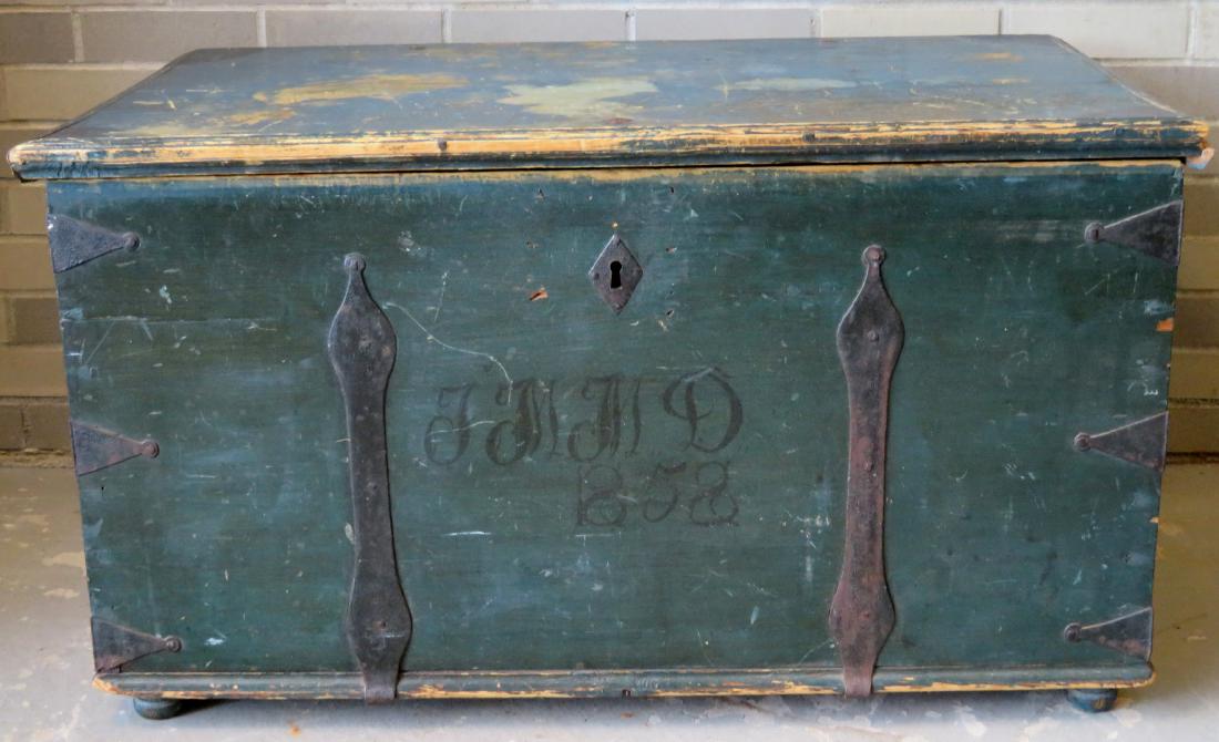 Blanket box in original blue paint and rust colored: Blanket box in original blue paint and rust colored corner decorations on lid. Hand forged decorative iron straps on all dovetailed corners and base - hand forged iron handles - decorative hand forged