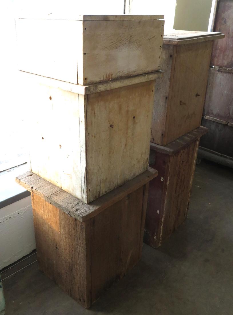 Four early wooden beehives in old paint, one in 2: Four early wooden beehives in old paint, one in 2 sections. 19th century. Fair condition. 17"H to 23.5"H. Provenance: From the locally historic Abraham E. VanWagner homestead, being in the same Dutche